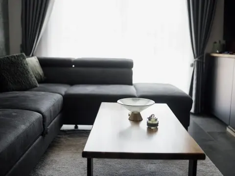 L-shaped sectional sofa, dark grey